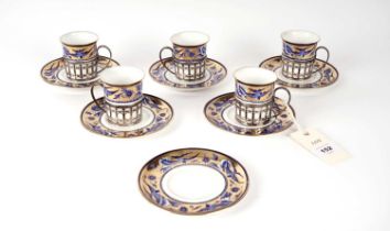 Five Shelley coffee cans and saucers with silver handles