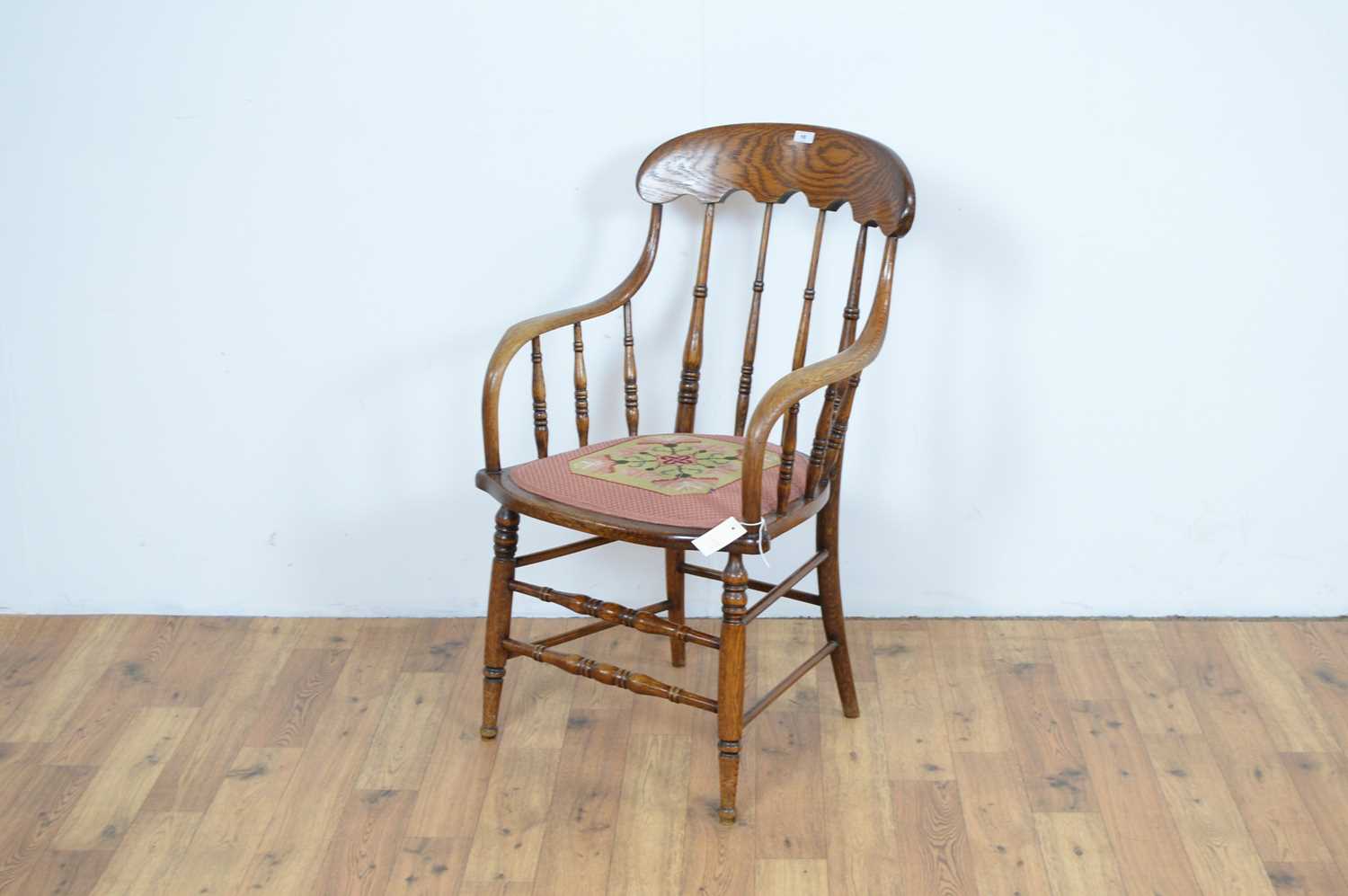 A 20th Century spindleback oak armchair