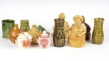 A collection of novelty kitchen storage jars and vases and others