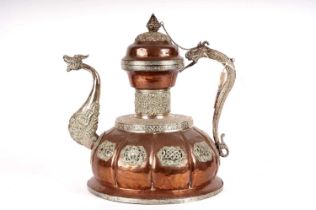 An Eastern copper and white metal coffee or tea pot