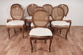 A set of eight stylish modern hardwood 'faux rope' dining chairs
