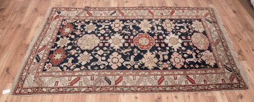 A Persian Islamic Sarouk rug
