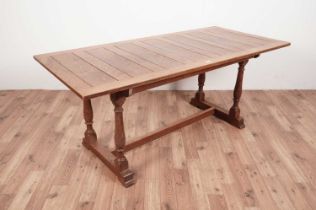 A 1920s oak panelled refectory table