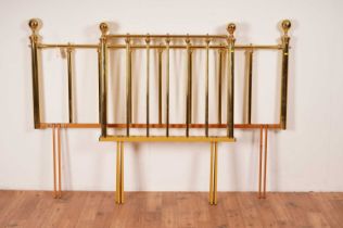 Three modern brass headboards