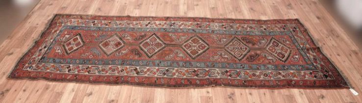 A Caucasian runner rug