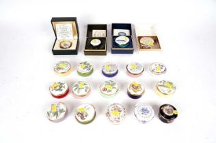 A selection of Crummels and other enamel pill boxes