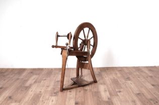 A 20th Century turned wood spinning wheel