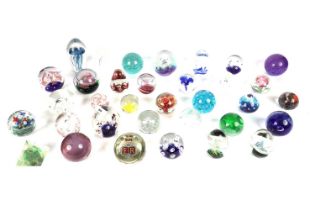 A selection of glass paperweights