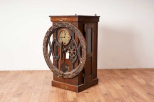 An Edwardian oak checking-in clock by The International Time Recording Co Ltd