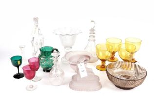 A selection of coloured and cut glass ware