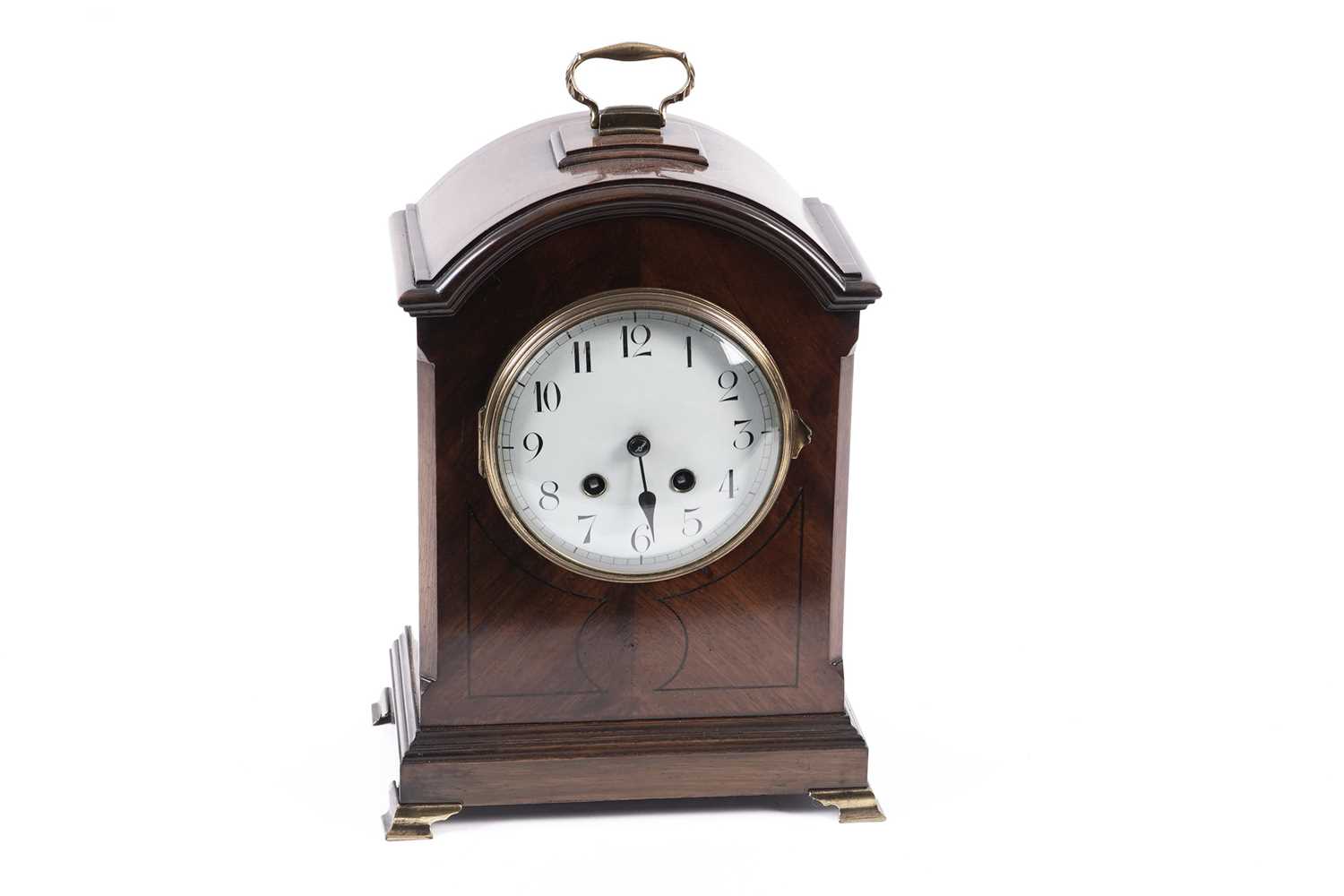 An early 20th Century line inlaid mahogany mantel clock