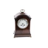 An early 20th Century line inlaid mahogany mantel clock