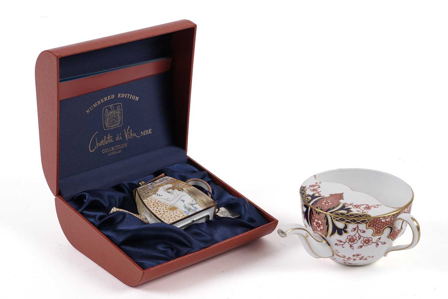 A Charlotte di Vita enamel tea pot and Royal Crown Derby ‘Imari’ pattern tea cup