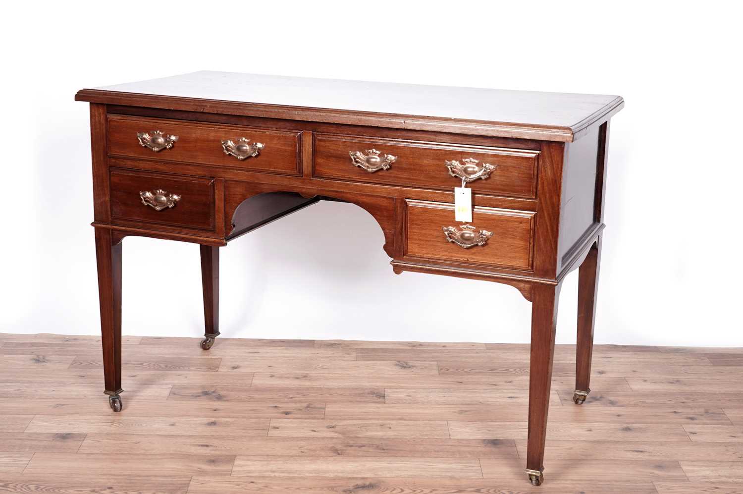 An Edwardian mahogany writing desk