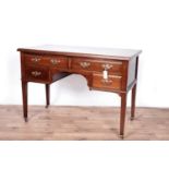 An Edwardian mahogany writing desk