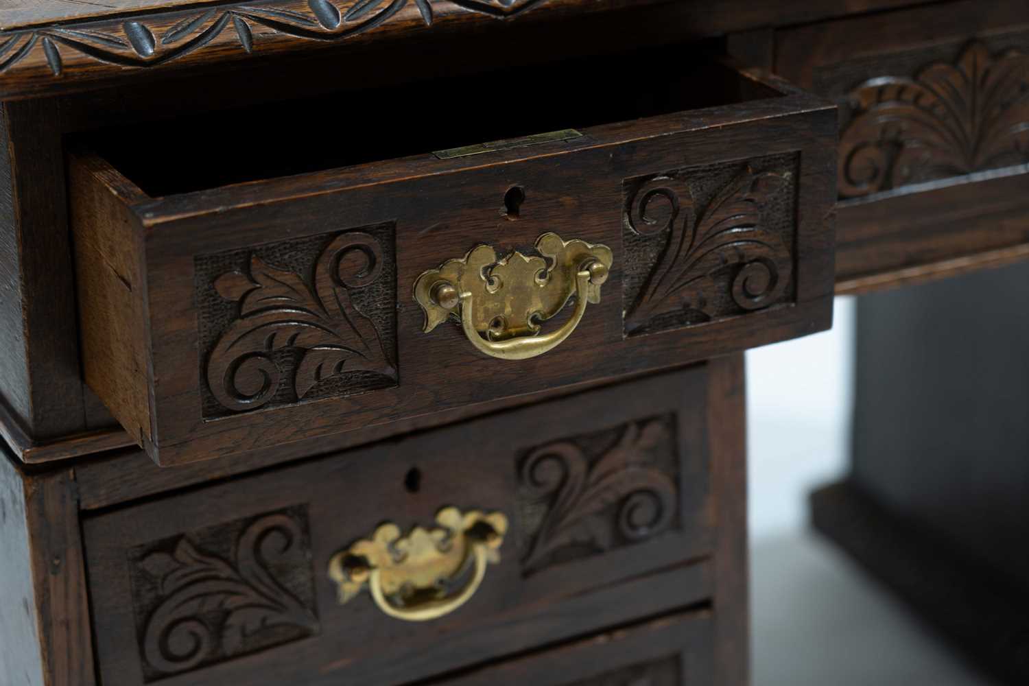 A Victorian carved oak desk - Image 4 of 6