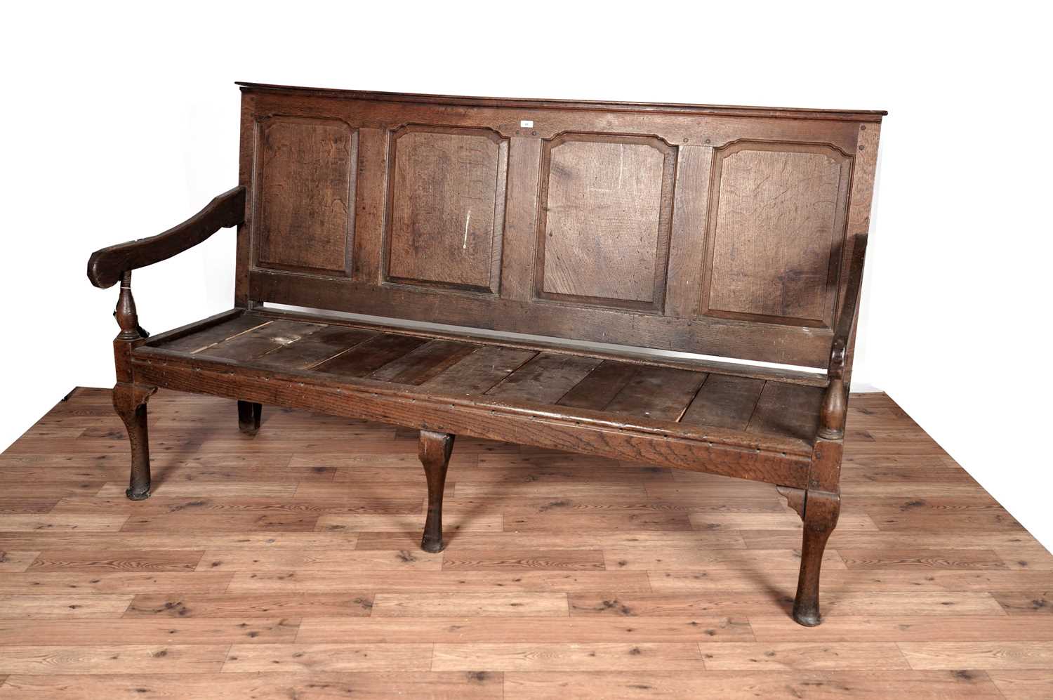 A Georgian oak hall settle