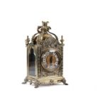 A 19th Century embossed brass mantel clock