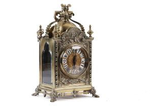 A 19th Century embossed brass mantel clock