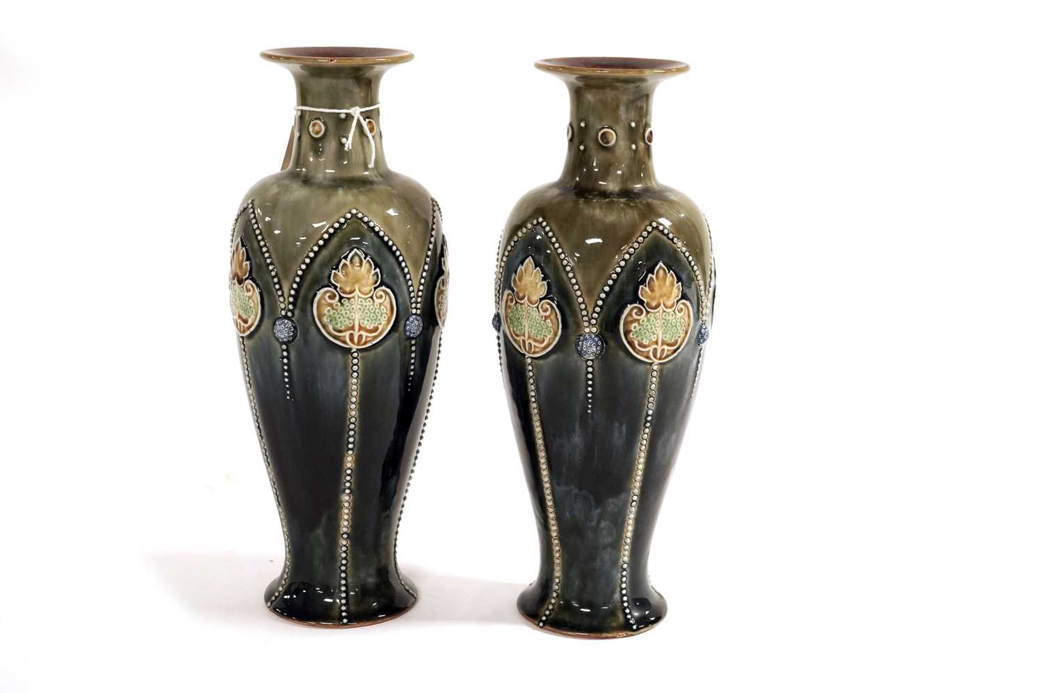 A pair of Doulton Lambeth baluster vases