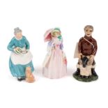Two Royal Doulton ceramic figures and a Coll Pottery ceramic figure