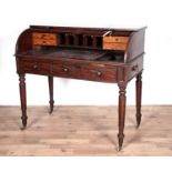 A George IV mahogany roll top desk