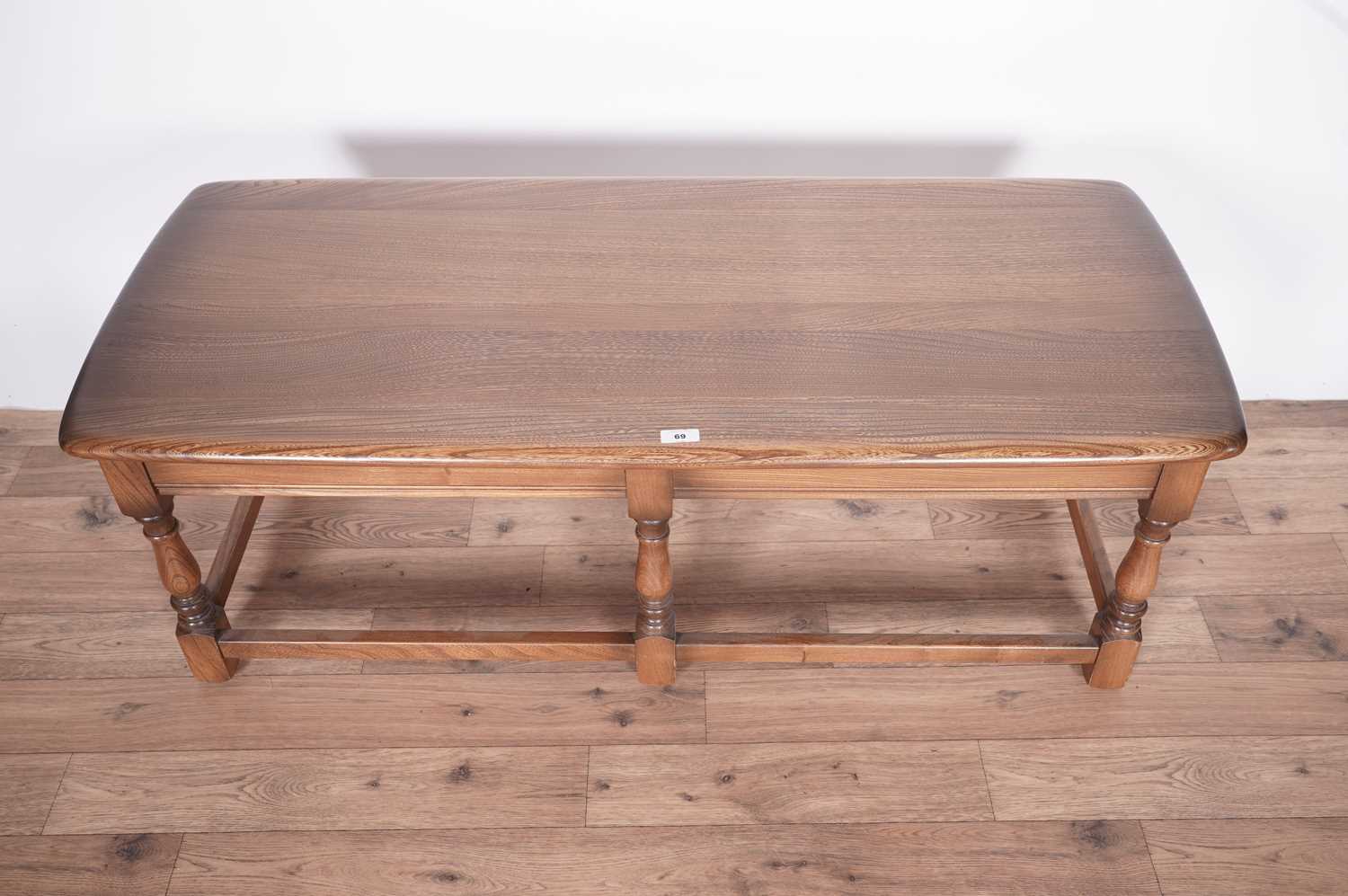 An Ercol elm coffee table - Image 3 of 16