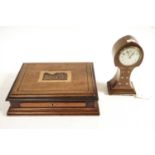 An early 20th Century Arts & Crafts inlaid mahogany mantel clock and Victorian sewing box