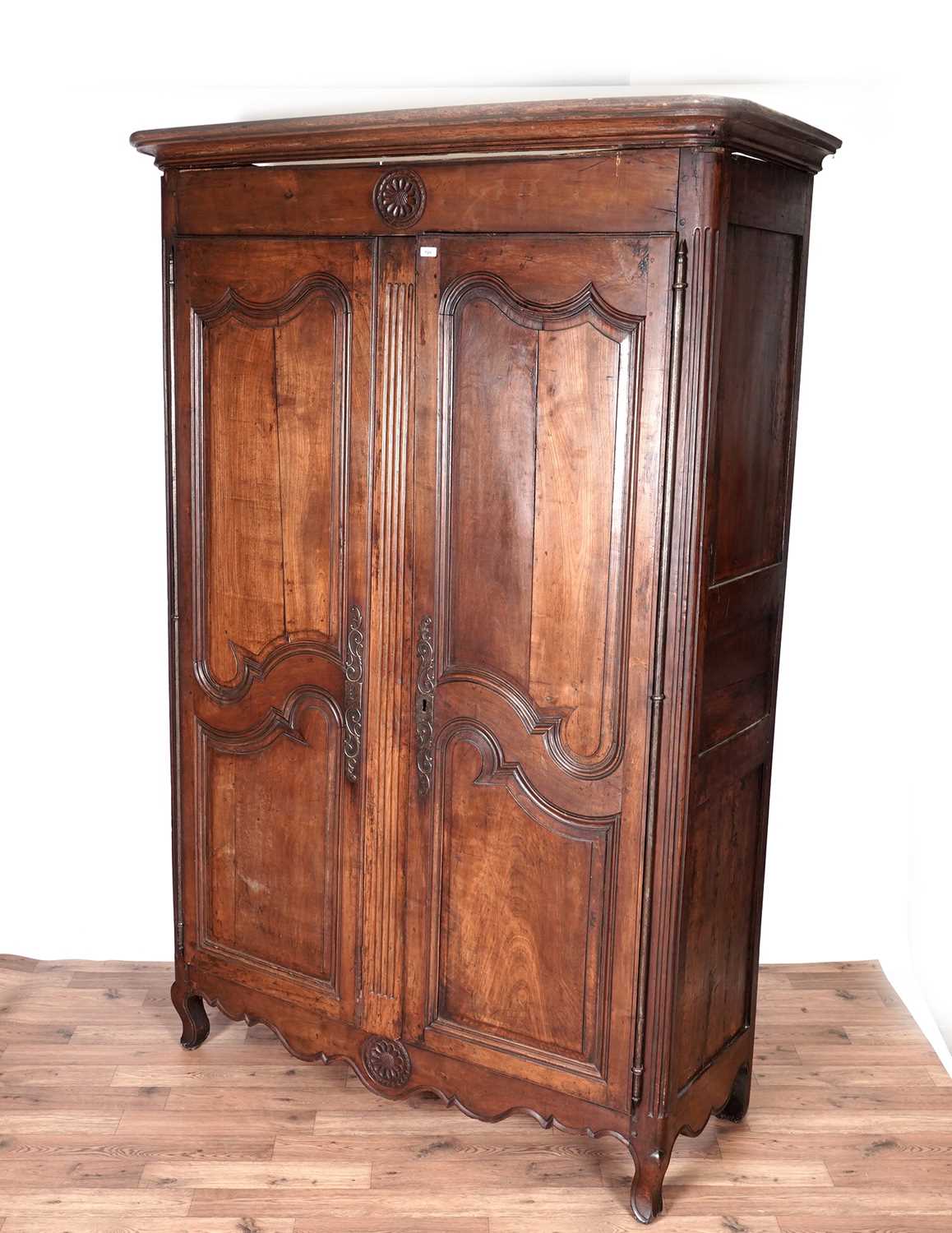 A French Provincial early/mid 19th Century fruitwood armoire