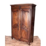 A French Provincial early/mid 19th Century fruitwood armoire
