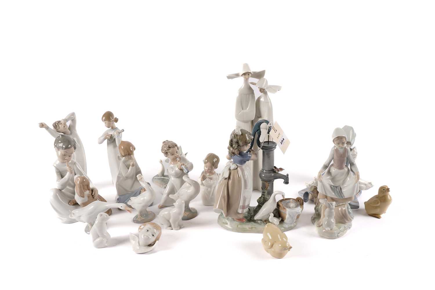 A collection Lladro and Nao figures