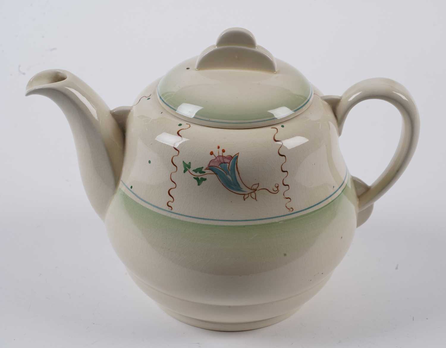 A Clarice Cliff tea service, decorated with stylised flowers in blue and pink - Image 6 of 9