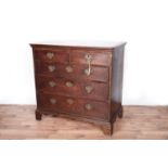 A George III oak chest of drawers