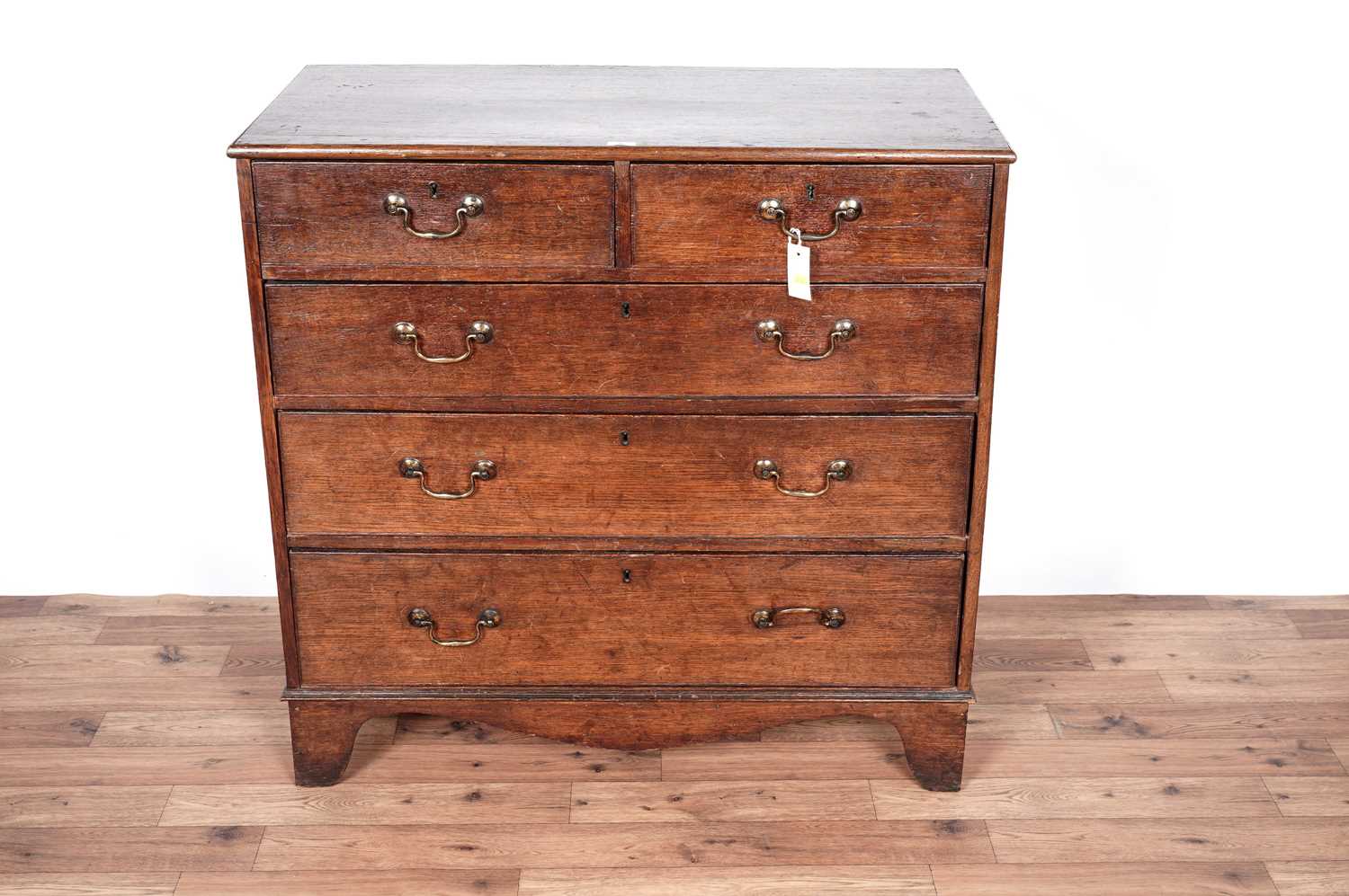 A George III oak chest of drawers - Image 2 of 9