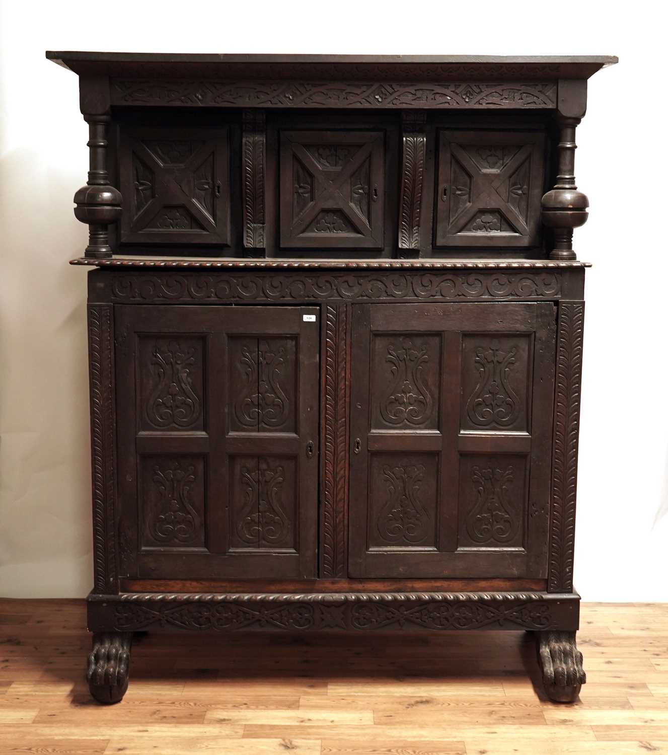 A 17th Century style carved oak buffet; and a 19th Century oak court cupboard - Image 10 of 13