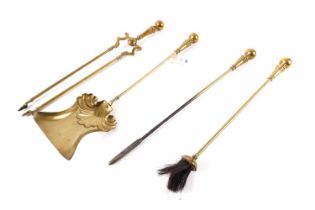 A 20th Century brass fire companion set