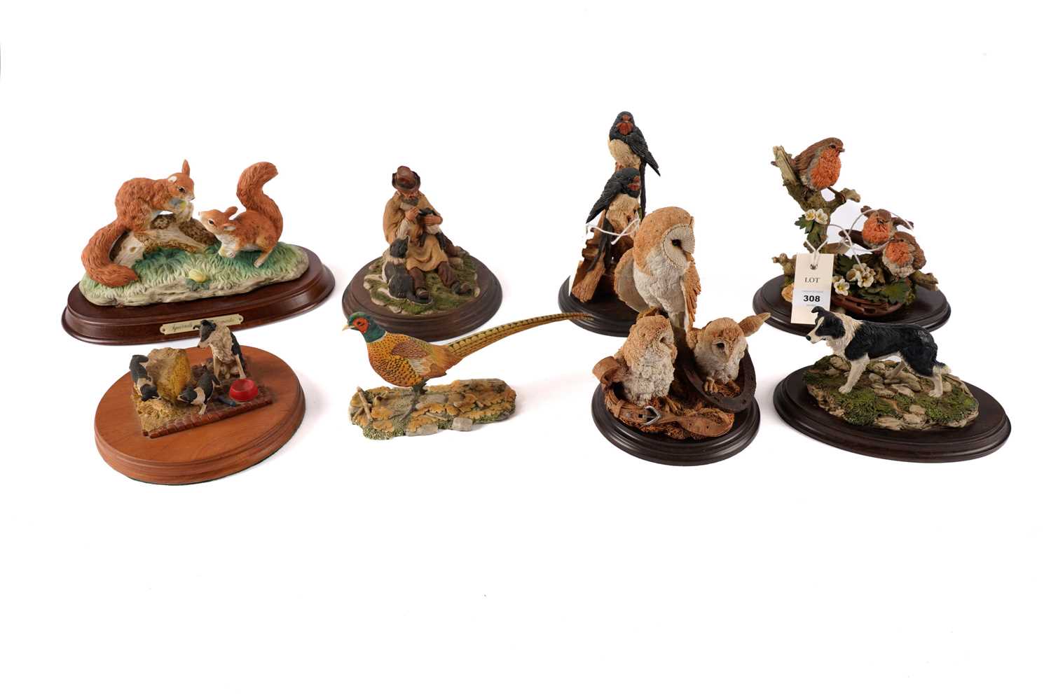 A collection of animal figure groups, by Border Fine Arts and other makers