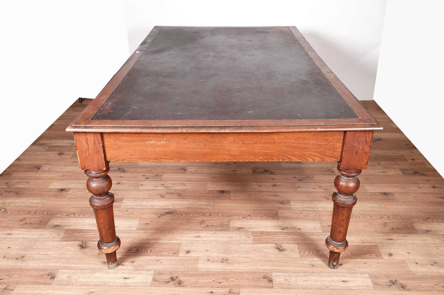 A substantial Victorian stained oak library table. - Image 2 of 4