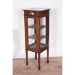 An Edwardian inlaid mahogany four-glass display cabinet