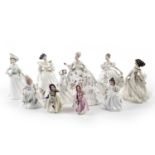 A collection of Royal Doulton ceramic figures of ladies