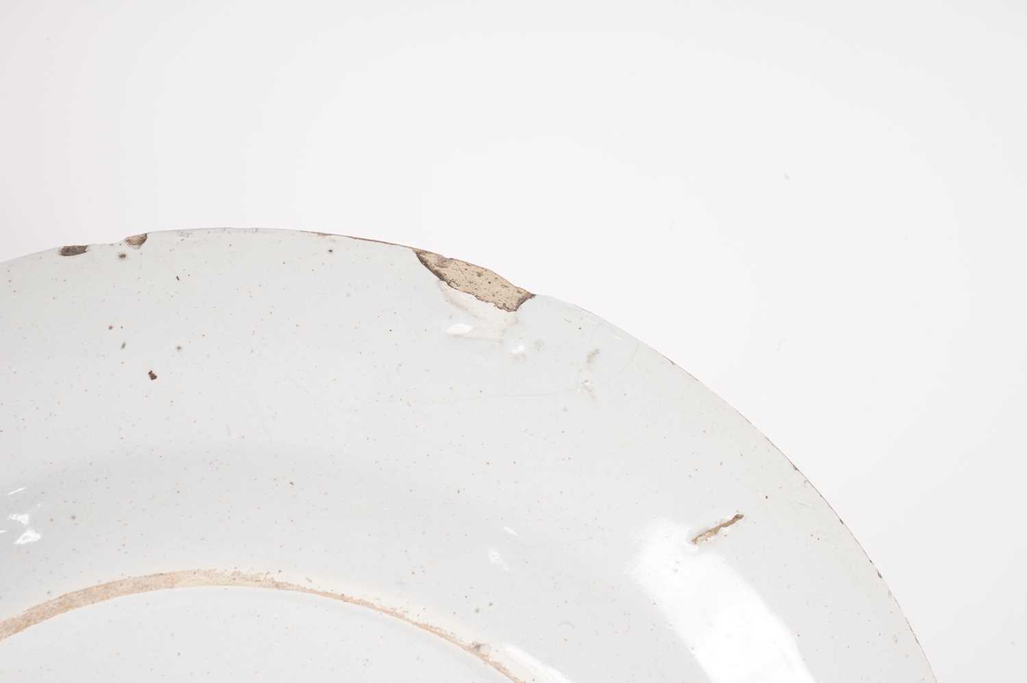 Four tin-glazed plates - Image 7 of 13