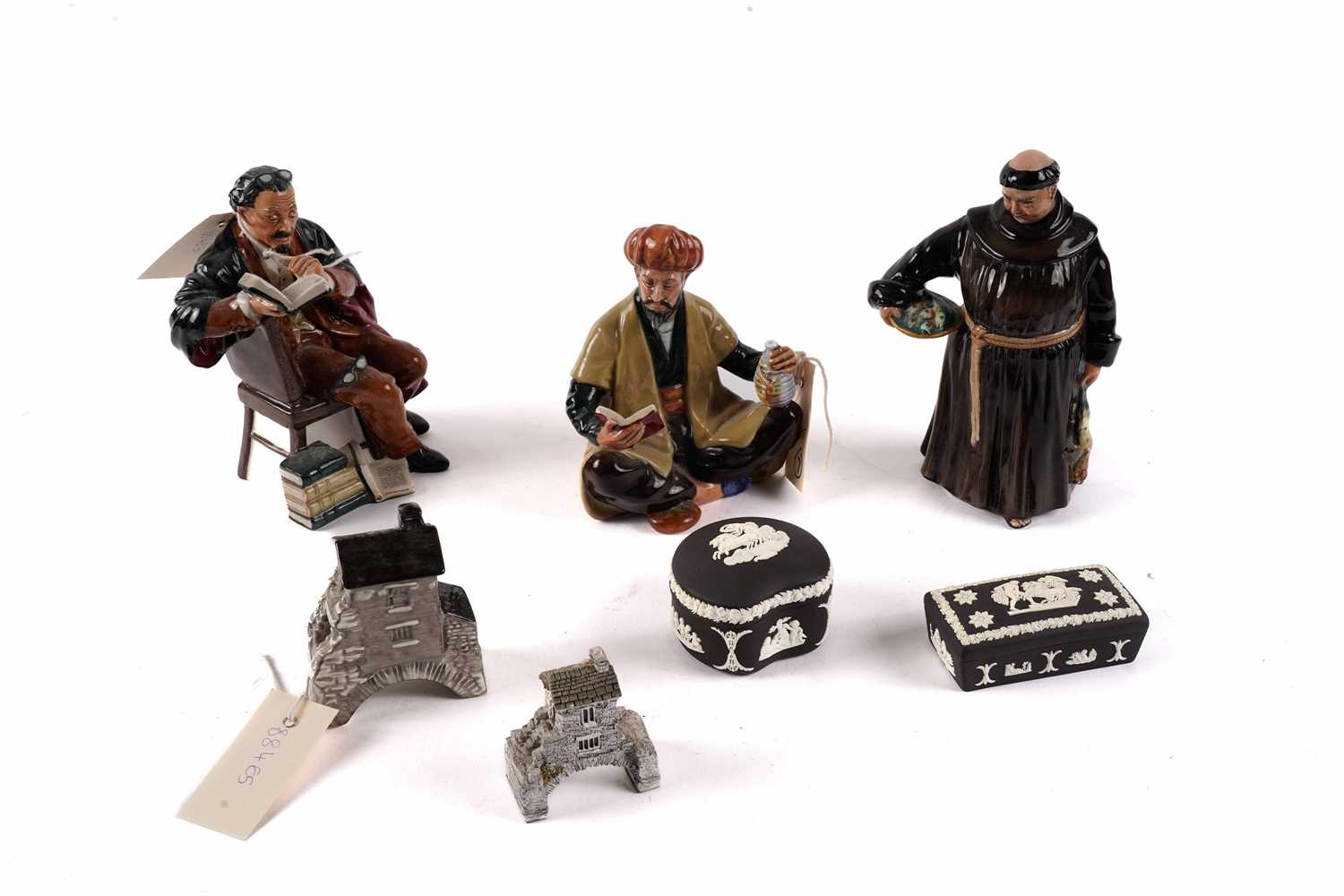 A collection of decorative Royal Doulton figures and other ceramics