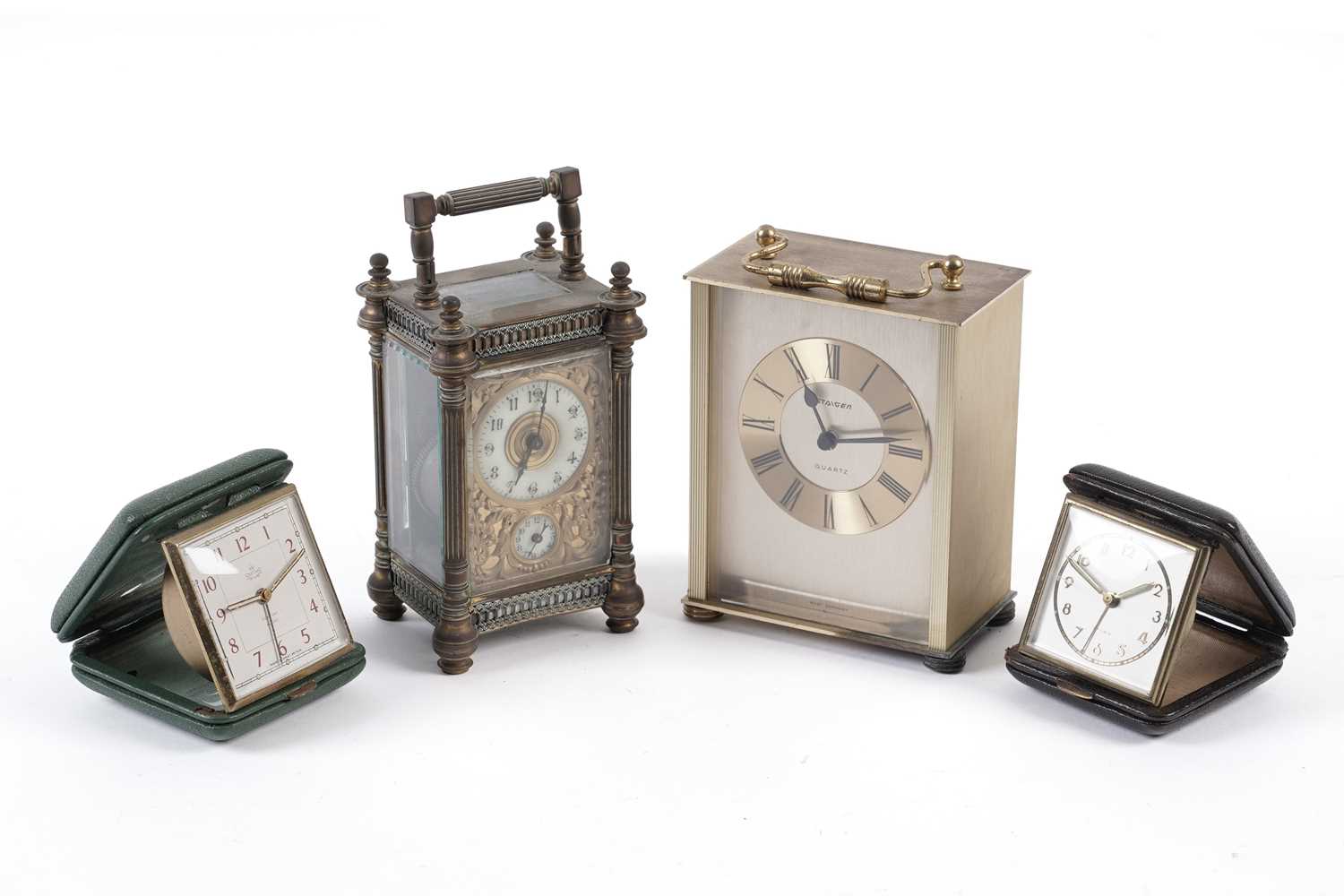 Late 19th Century French carriage alarm clock; and three others