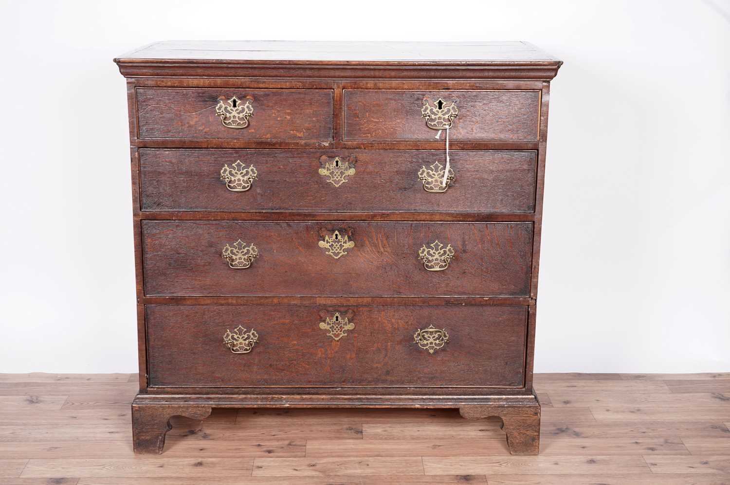 A George III oak chest of drawers - Image 2 of 14