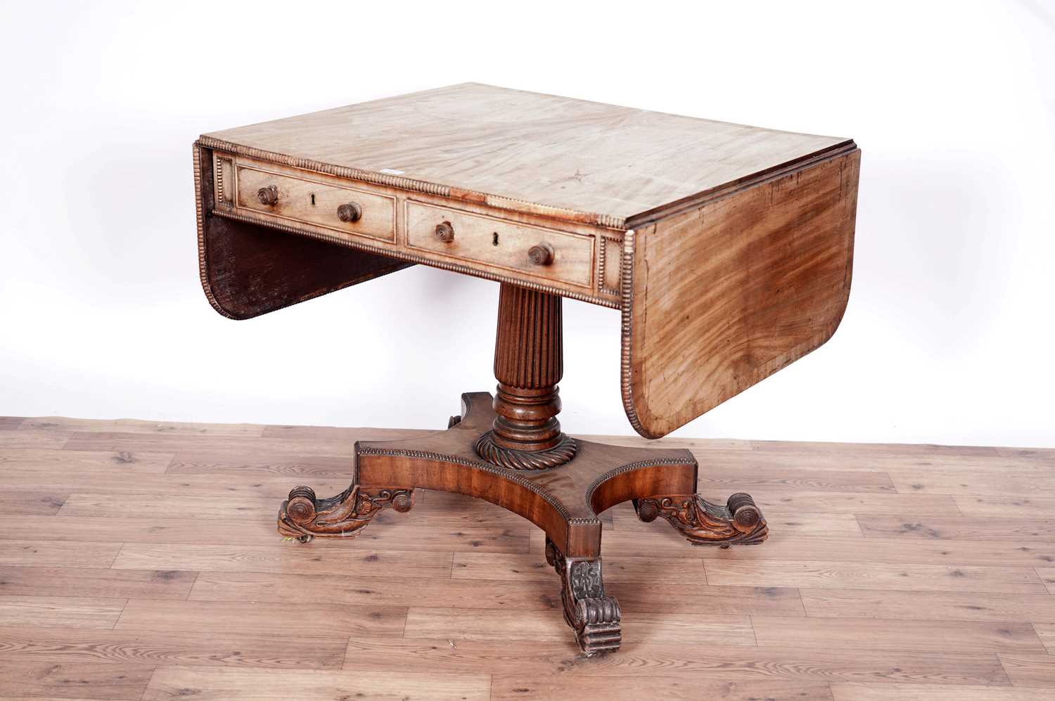 A late Regency mahogany sofa table