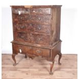 An early 18th Century burr walnut chest on stand