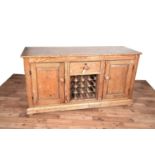 A Victorian stripped-pine sideboard