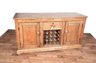 A Victorian stripped-pine sideboard