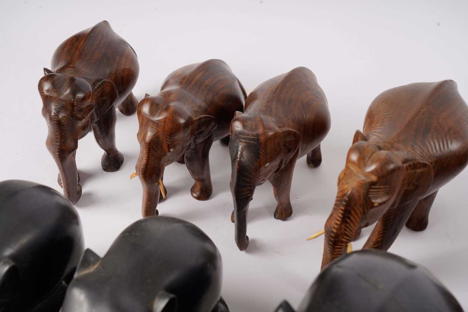 A collection of Asian carved hard wood elephant figures - Image 3 of 3