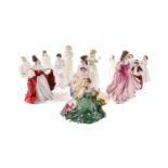 A collection of Royal Doulton decorative ceramic figures of ladies